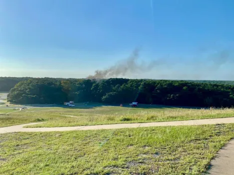 An Airiel photo of the smoke from the plane crash at the Wright Brothers Memorial.
(Courtesy of Daily Press)