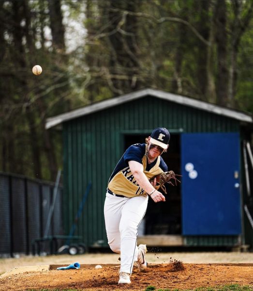 Charlie warming up before heading into face the Tabb Tigers. - flixbyjr via Instagram