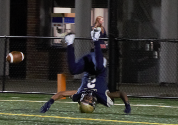 Naye'Ron Hudson flipping into the endzone as he failed to catch the ball for the touchdown.