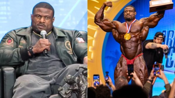 Andrew Jacked front double biceps with his hard earned first-place medal and trophy.