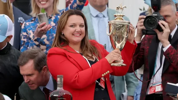 Cherie Devaux shows off her historical trophy.